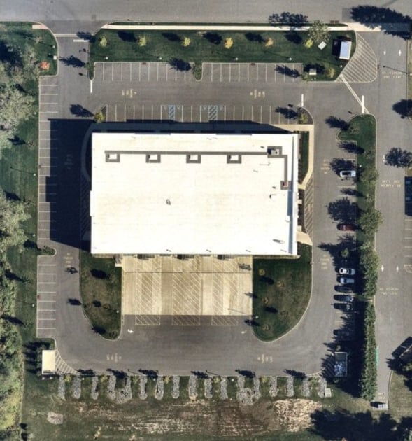 How much does it cost to sealcoat a 50,000 sq ft parking lot