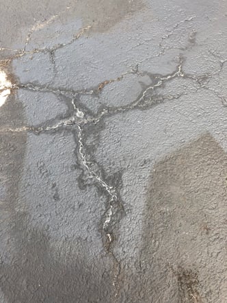 Underground water causes pavement sealer failure