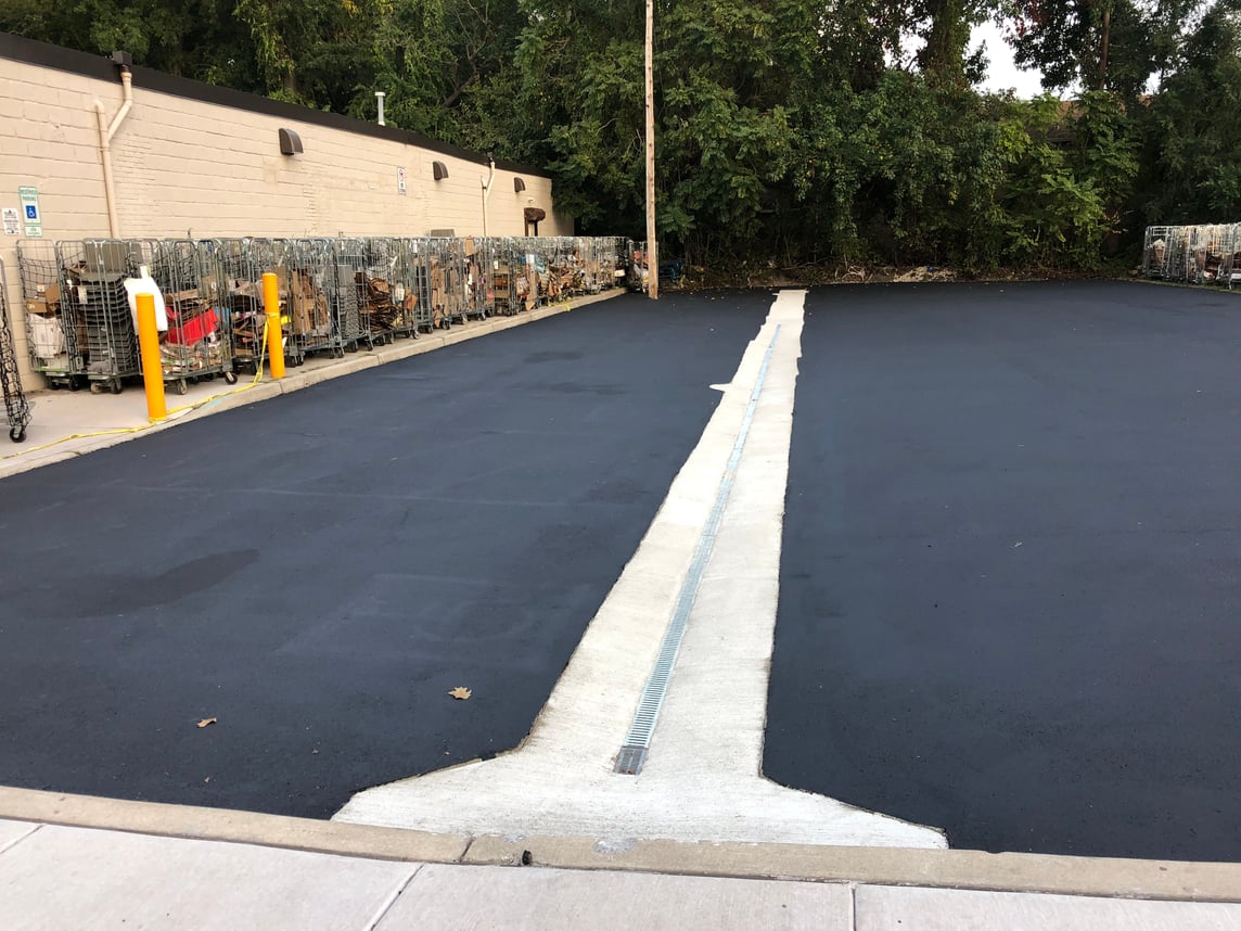 💧 How to Fix Standing Water in Your Parking Lot (Without Tearing It Up)