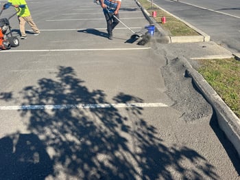How much does it cost to sealcoat and asphalt parking lot
